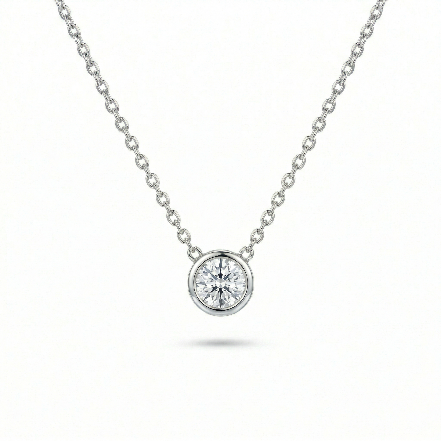 White Gold white diamond round necklace on a white background