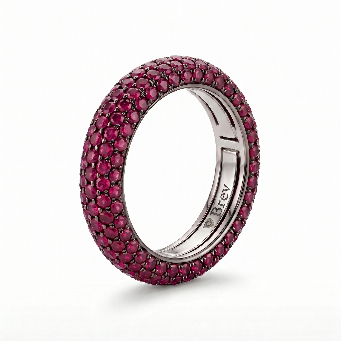 Ring with pink gemstones on a white background