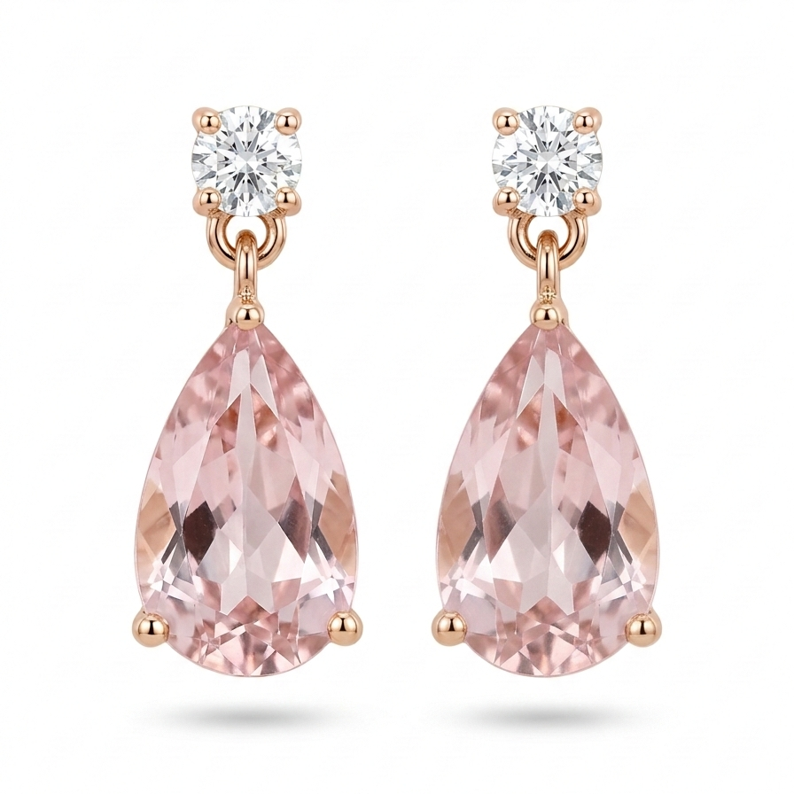Pair of pink teardrop earrings with rose gold setting on a white background