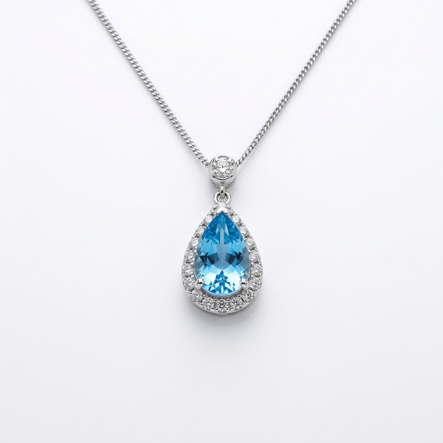 Teardrop-shaped blue gemstone necklace on a white background