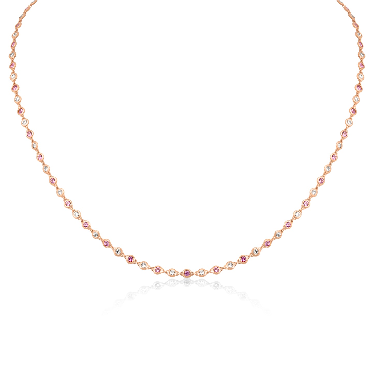 Rose gold necklace with small pink stones on a white background