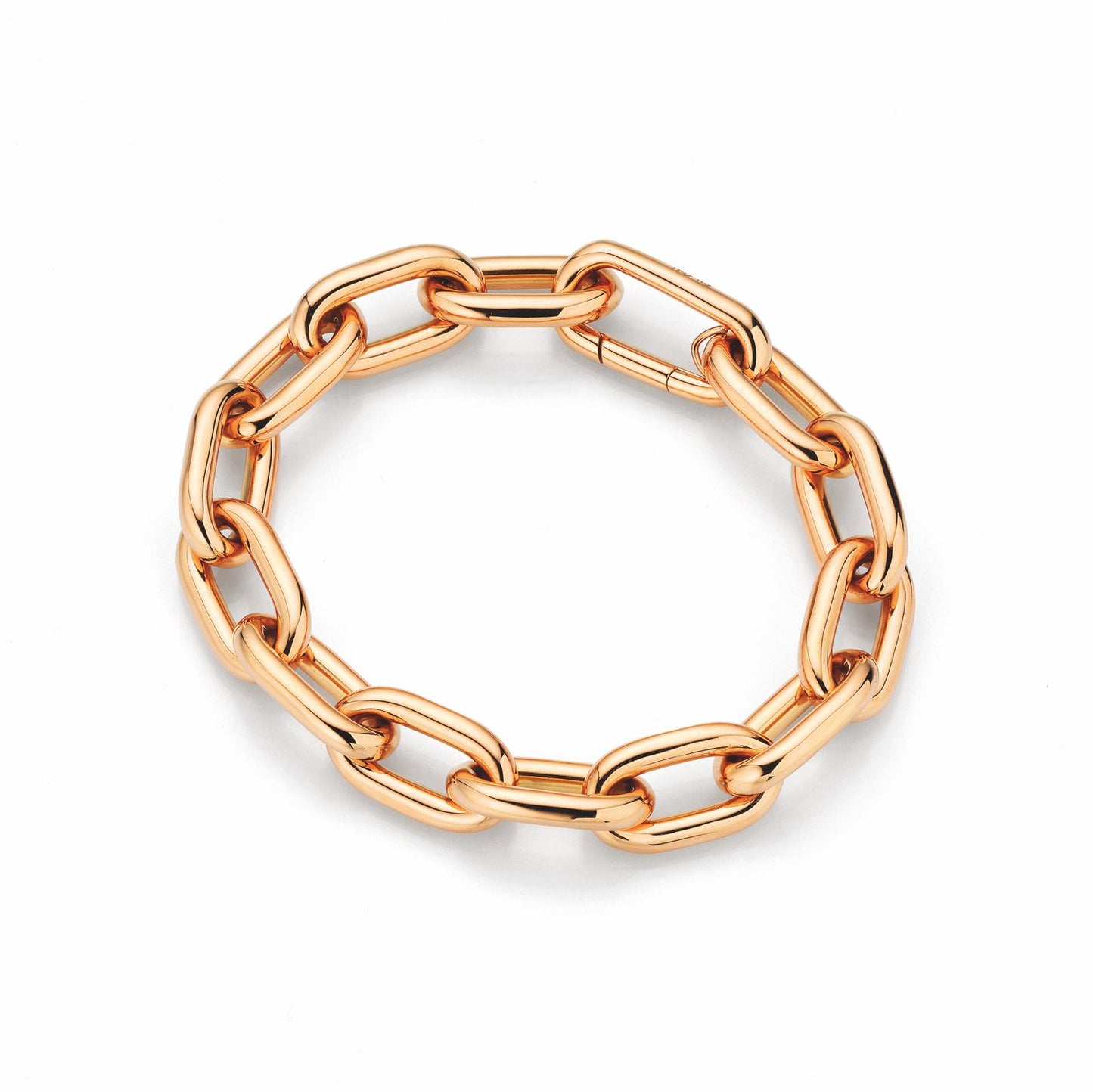 yellow gold chain-style ring on a white background