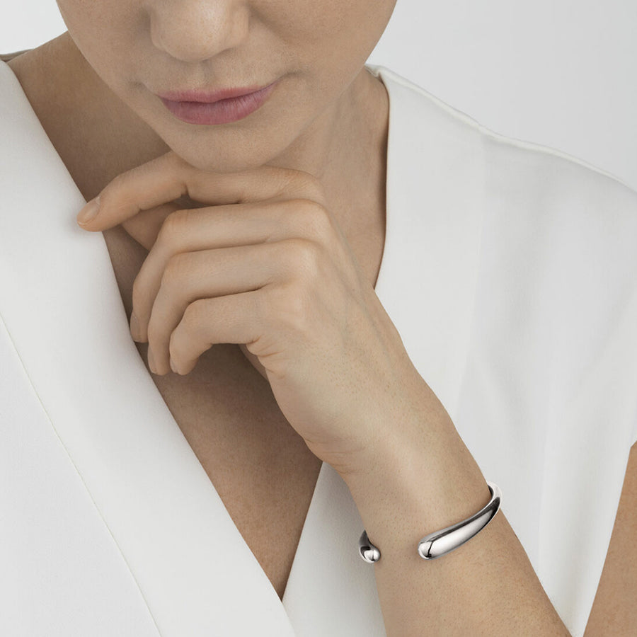 Georg Jensen Silver Mercy Open Bangle worn on a model
