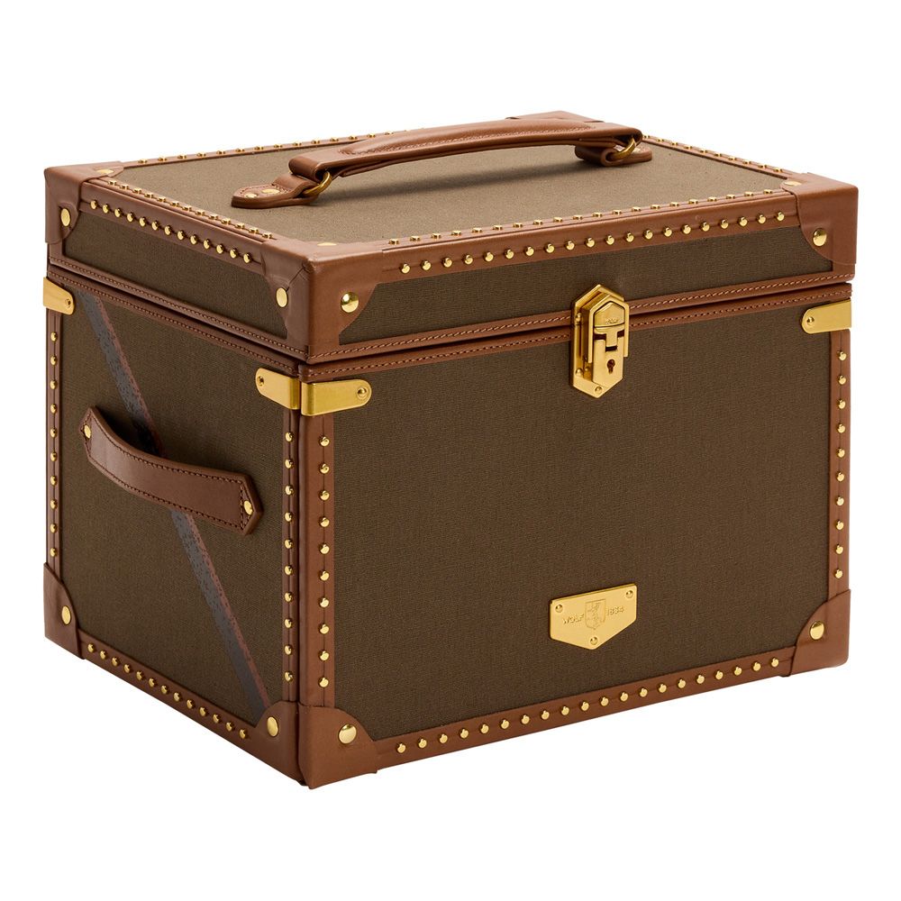 Brown leather suitcase with gold accents on a white background