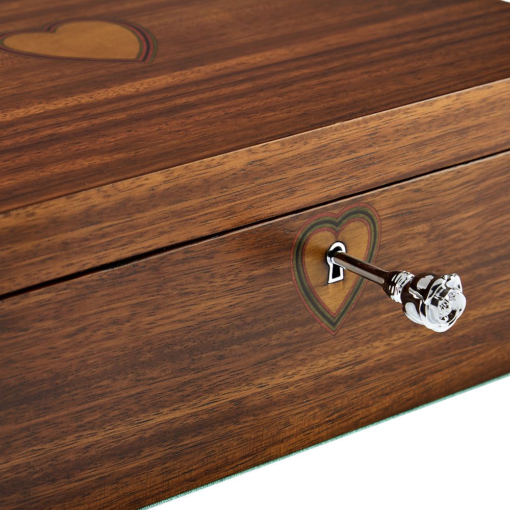 Wooden box with heart-shaped design and key handle on a white background