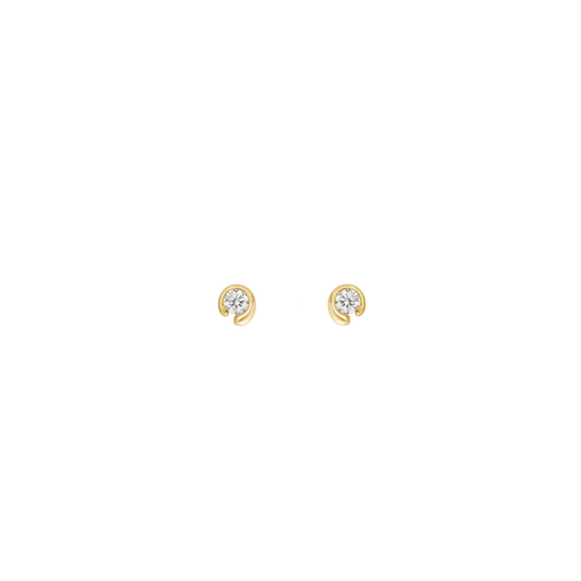 Pair of gold earrings with clear gemstones on a white background