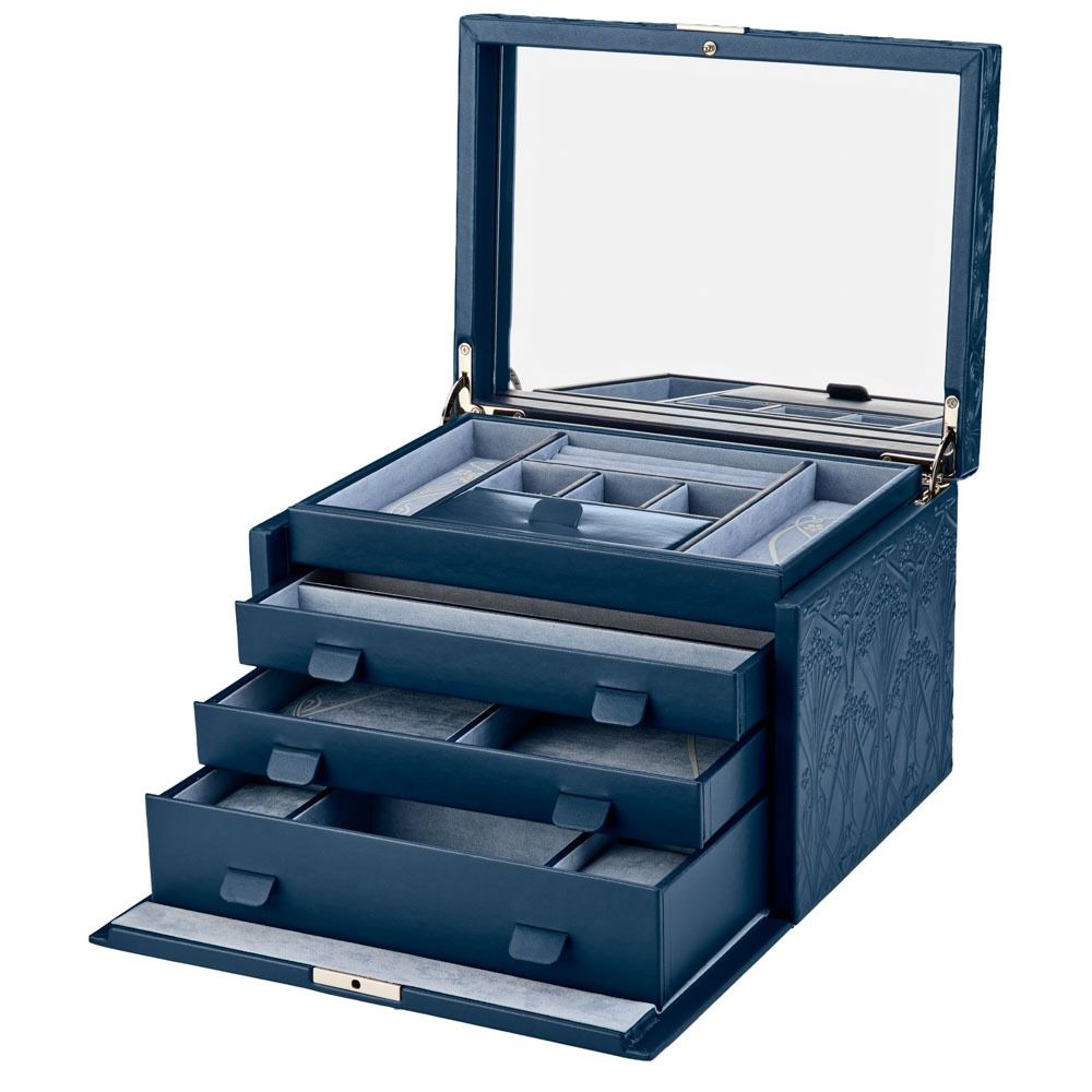 Blue jewelry box with multiple compartments on a white background
