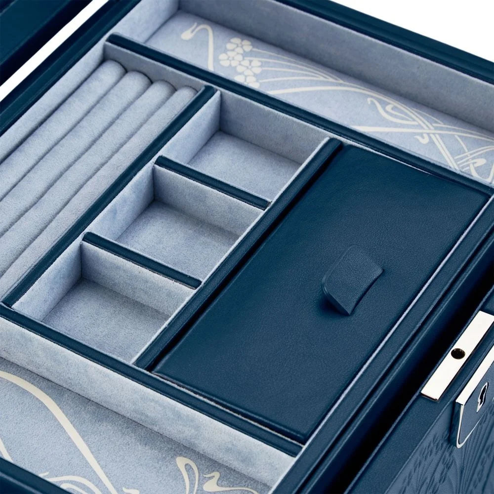 Open jewelry box with compartments and decorative lid