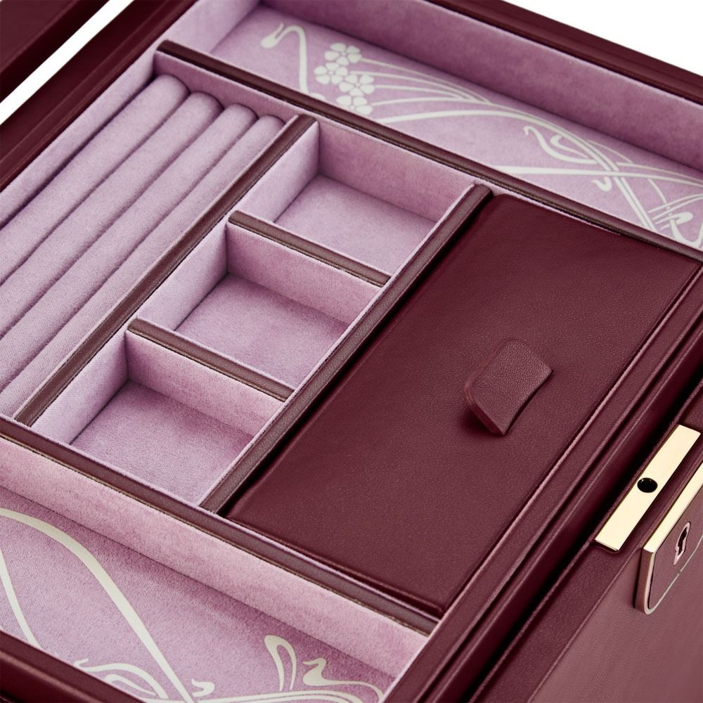 Jewelry box with compartments and a decorative lid
