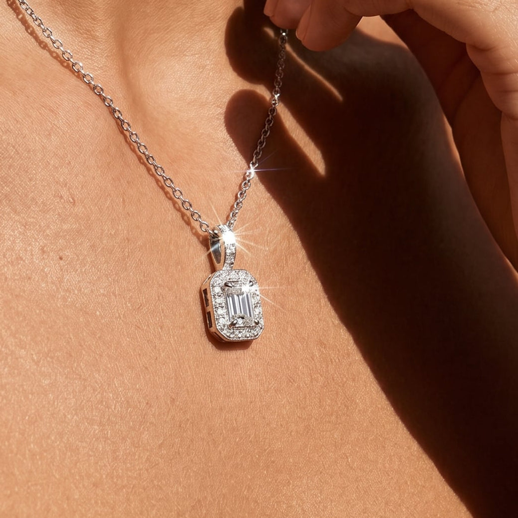 emerald cut diamond pendant on a model 