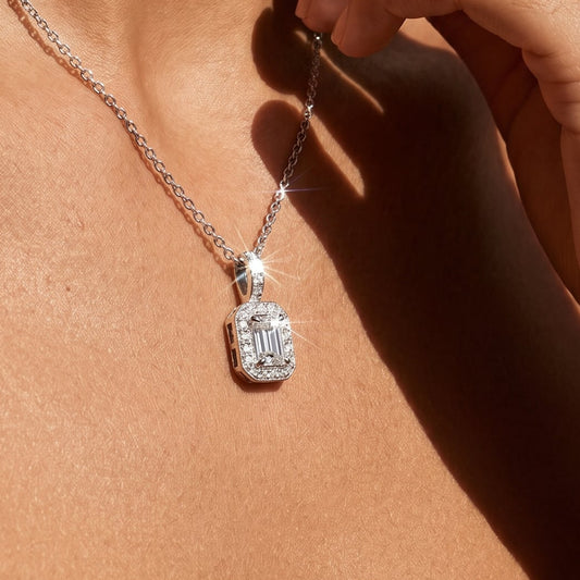 emerald cut diamond pendant on a model 