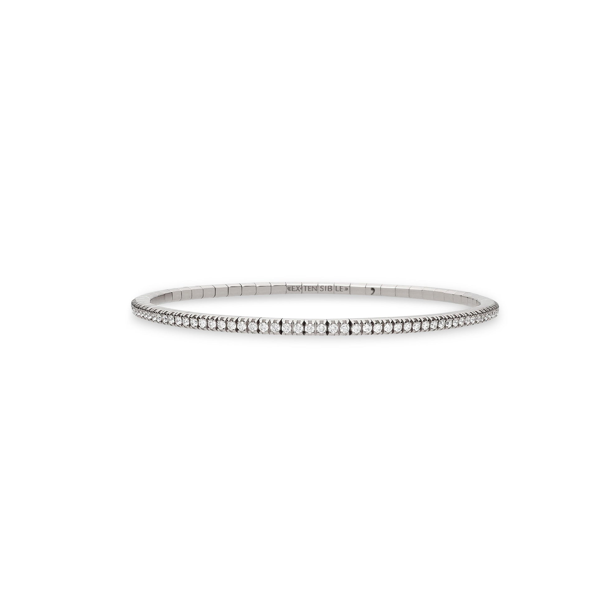 A thin silver-toned bangle bracelet with a row of small clear stones, centered on a plain white background.