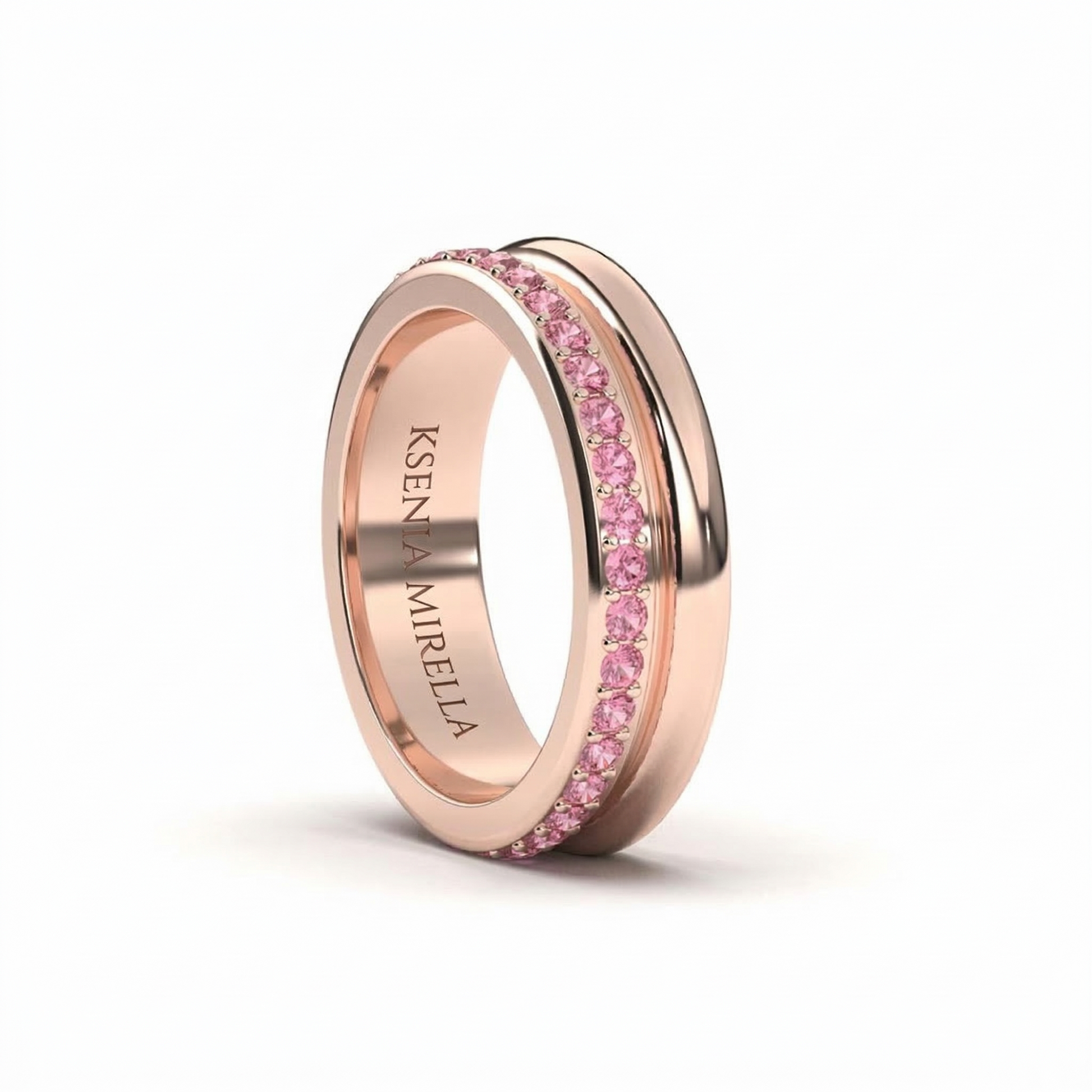 rose gold double band full pink sapphire eternity band on a white background 