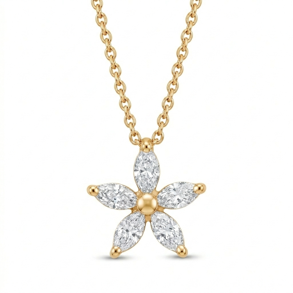 A delicate flower pendant featuring five marquise-cut diamonds as petals, totaling 0.55ct, set in 18ct yellow gold. High-resolution packshot on a clean background by Peter Ungar.
