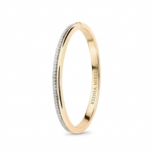 yellow gold white diamond double band bangle on a white background 