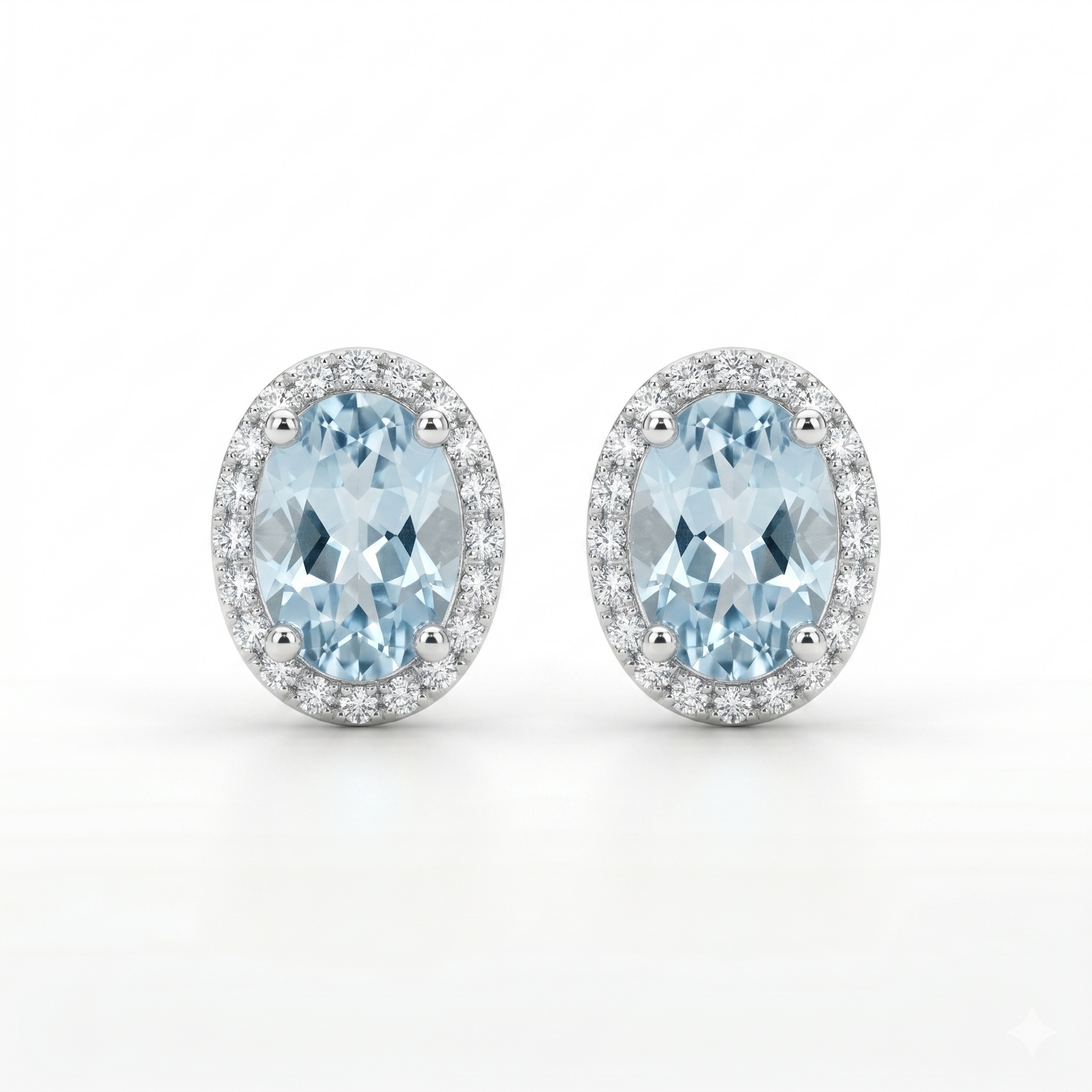 Pair of earrings with blue gemstones on a white background