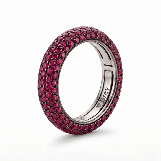 Ring with pink gemstones on a white background