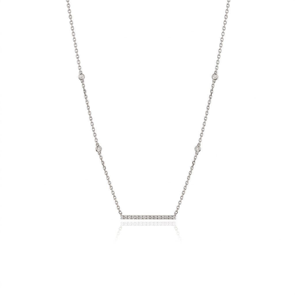 A white gold necklace featuring a bar pendant with diamonds, accompanied by a chain with multiple adjustable lengths.