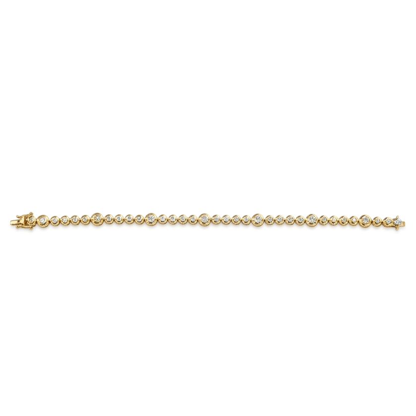 Gold chain bracelet and white diamonds on a white background