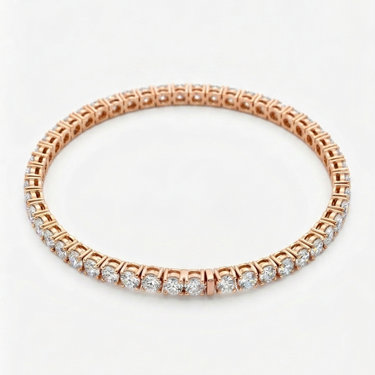 Rose gold tennis bracelet with clear stones on a white background