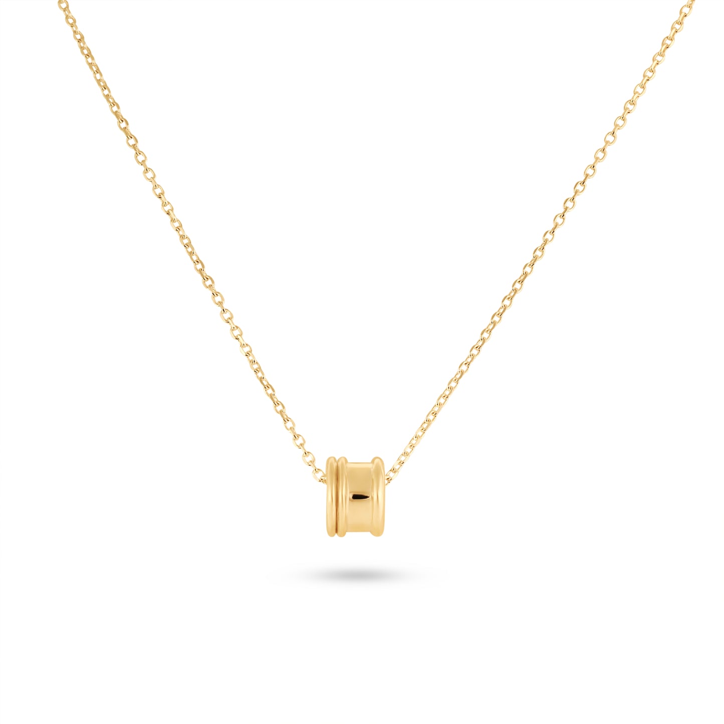 Gold necklace with a small bead pendant on a white background