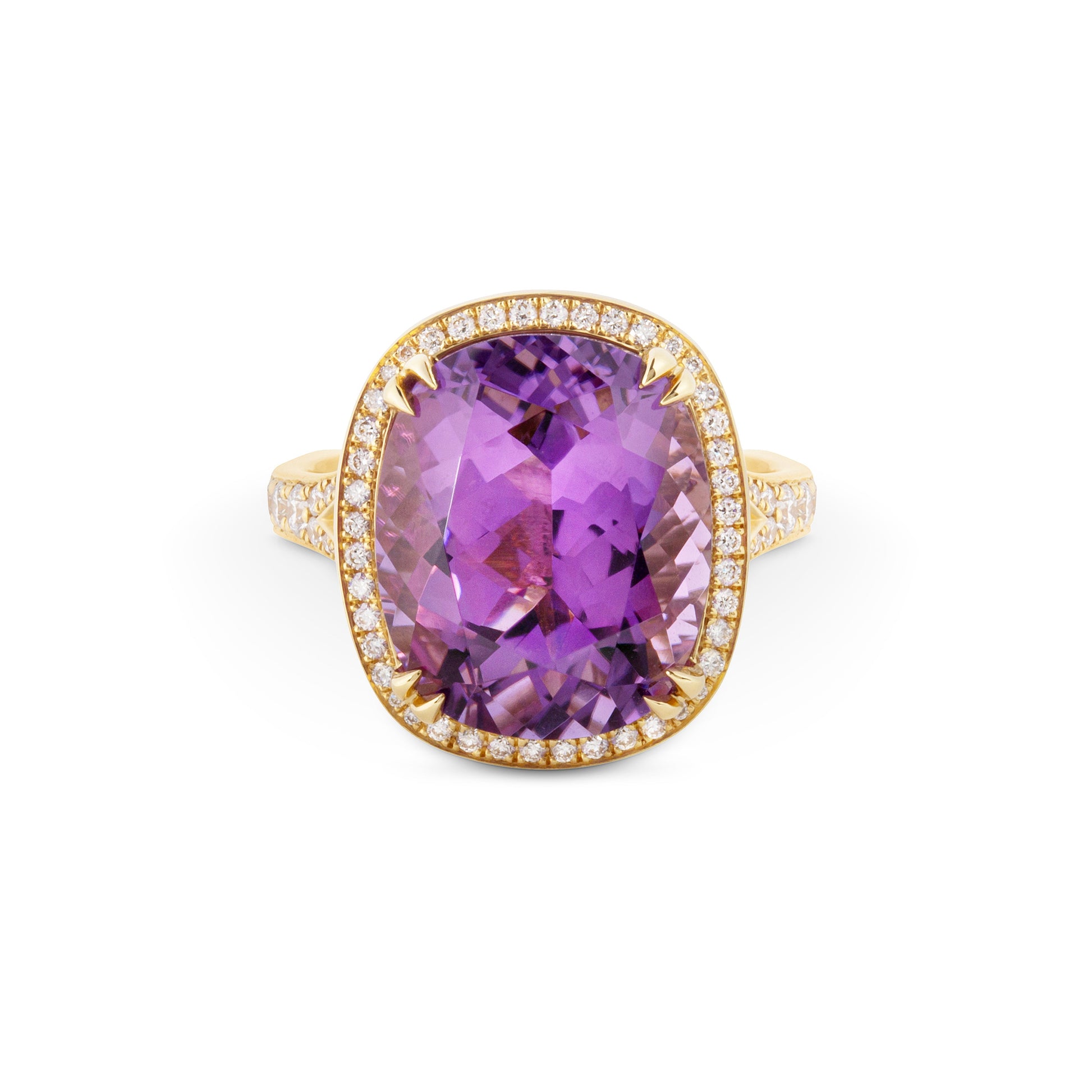 Ring with a purple amethyst gemstone and gold band on a white background