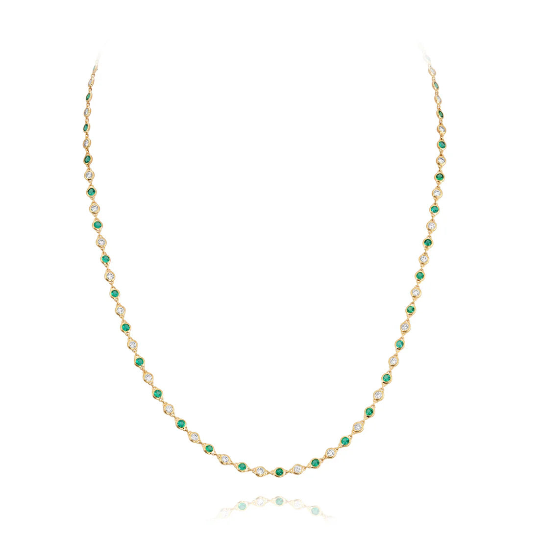 Necklace with green and gold beads on a white background