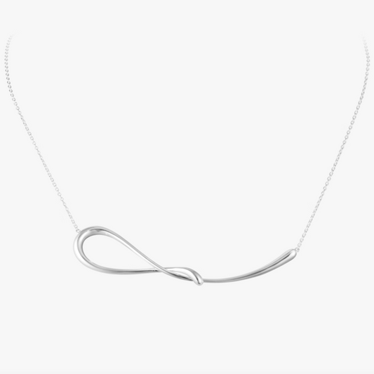 Silver necklace with a unique pendant on a white background