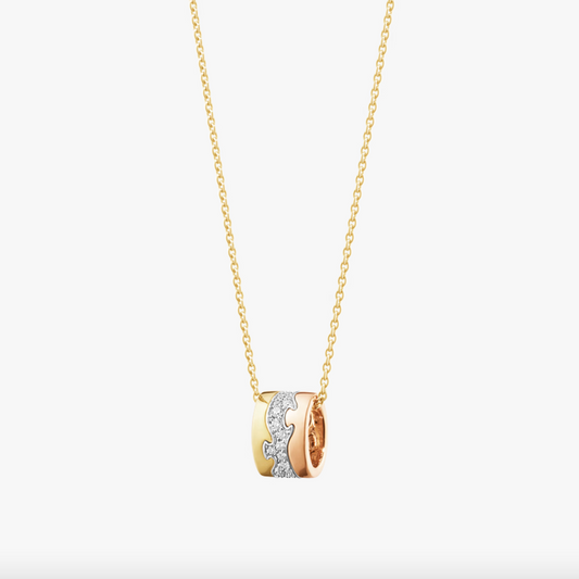 Gold necklace with a pendant on a white background