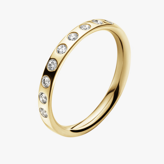 Gold ring with small diamonds on a white background