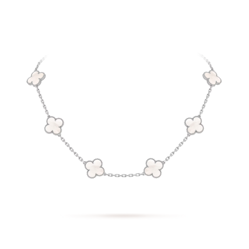 Silver necklace with floral designs on a white background