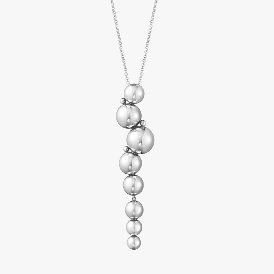 Silver necklace with spherical beads on a white background