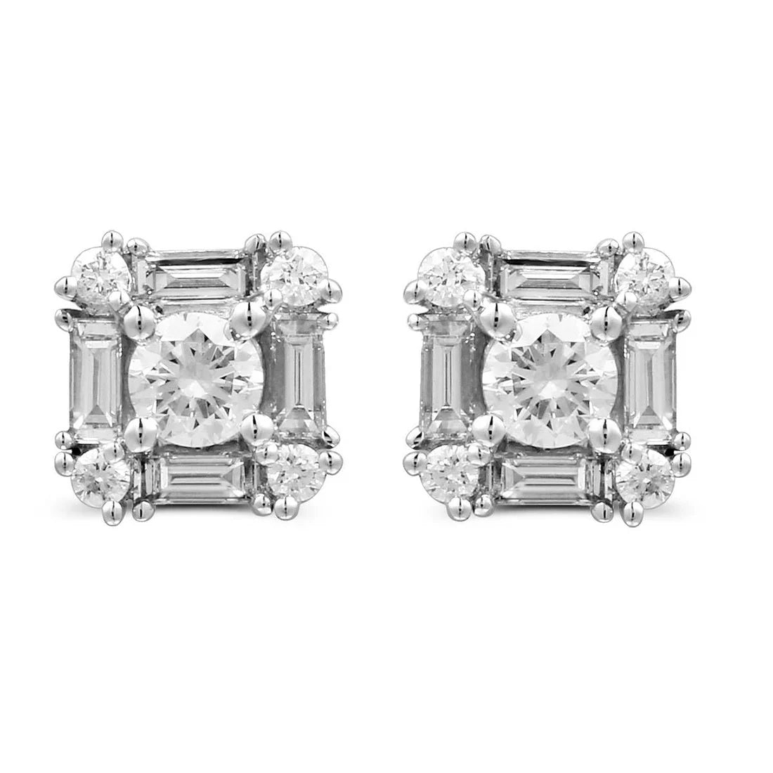 Pair of diamond earrings on a white background