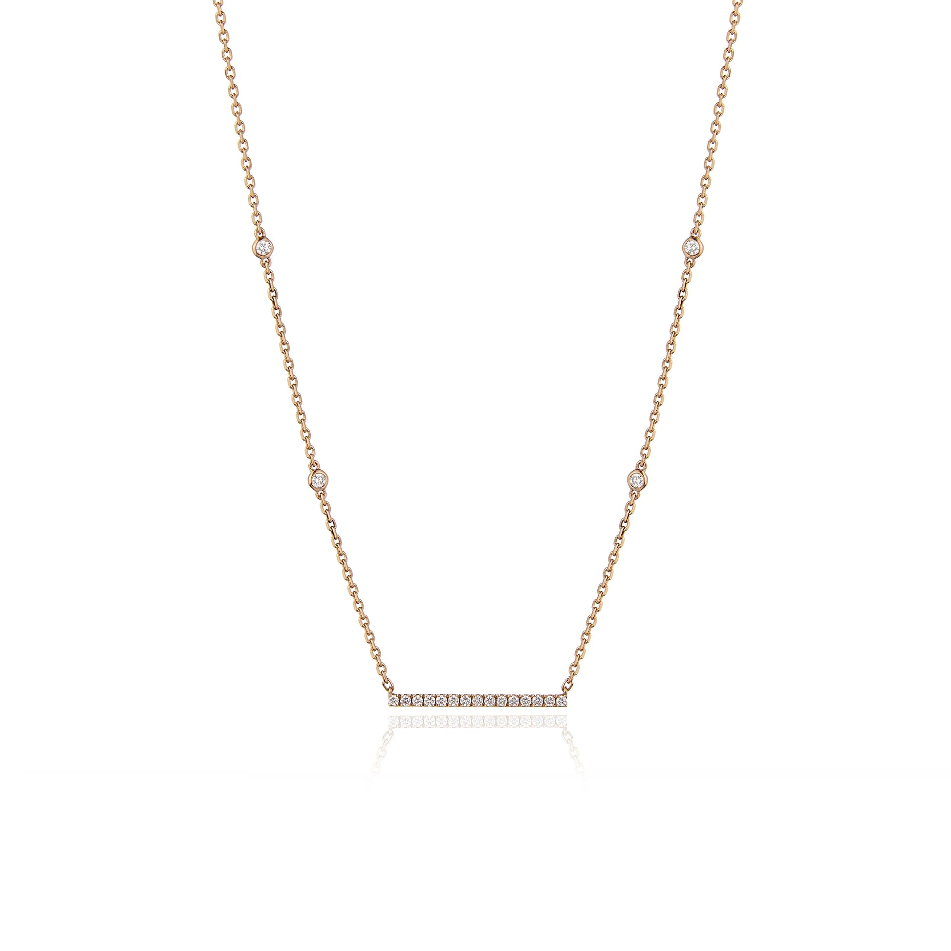 A yellow gold necklace featuring a bar pendant with diamonds, accompanied by a chain with multiple adjustable lengths.