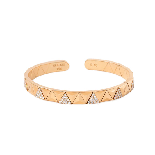 A rose gold cuff bracelet with a geometric triangle pattern, featuring pavé-set clear crystals in the triangular gaps, shown on a plain white background.