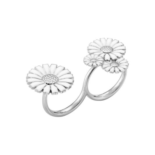 Silver flower-shaped ring on a white background