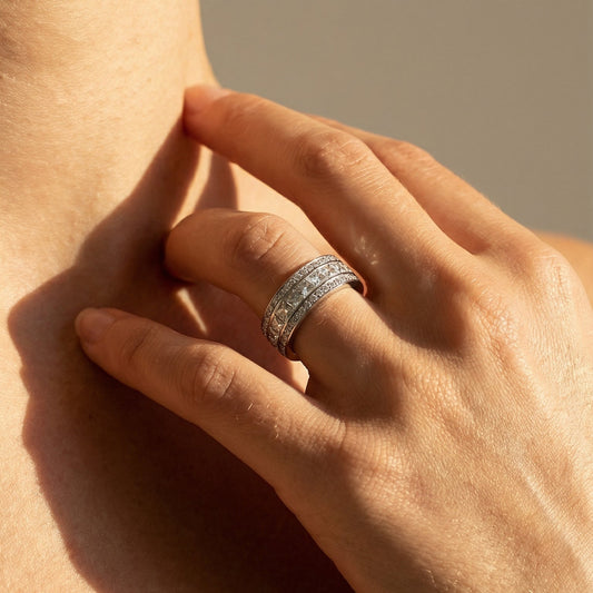 three row full eternity band made in platinum with princess cut diamonds close up image on a models hand 