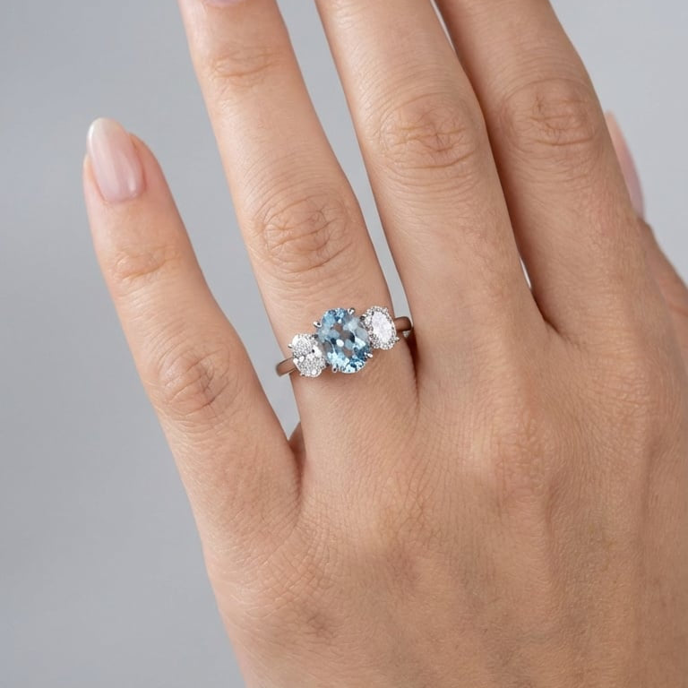 An Oval Aquamarine & Diamond Trilogy | Platinum Ring