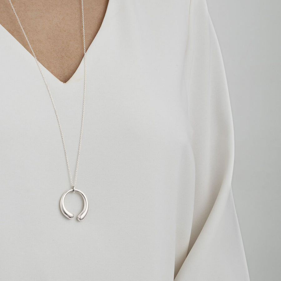 Georg Jensen Silver Mercy Large Pendant worn on a model